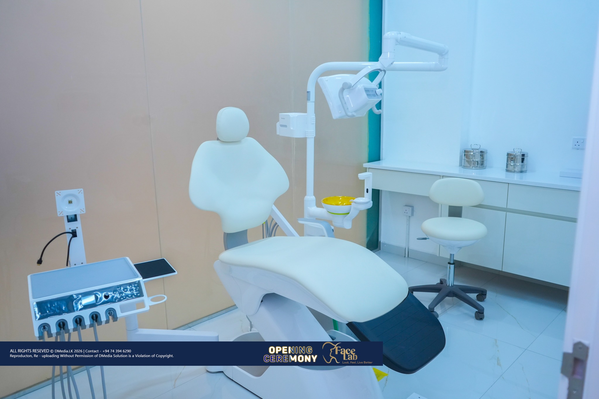A FaceLab dental treatment room with the chair, overhead light and instrument console